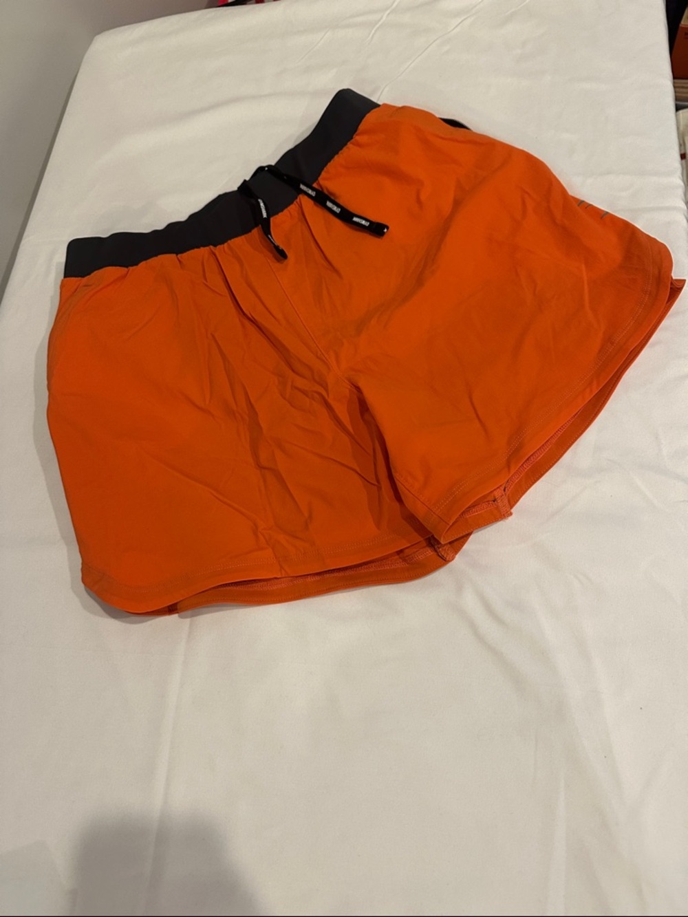 Gymshark Orange Athletic Shorts with Black Waistband